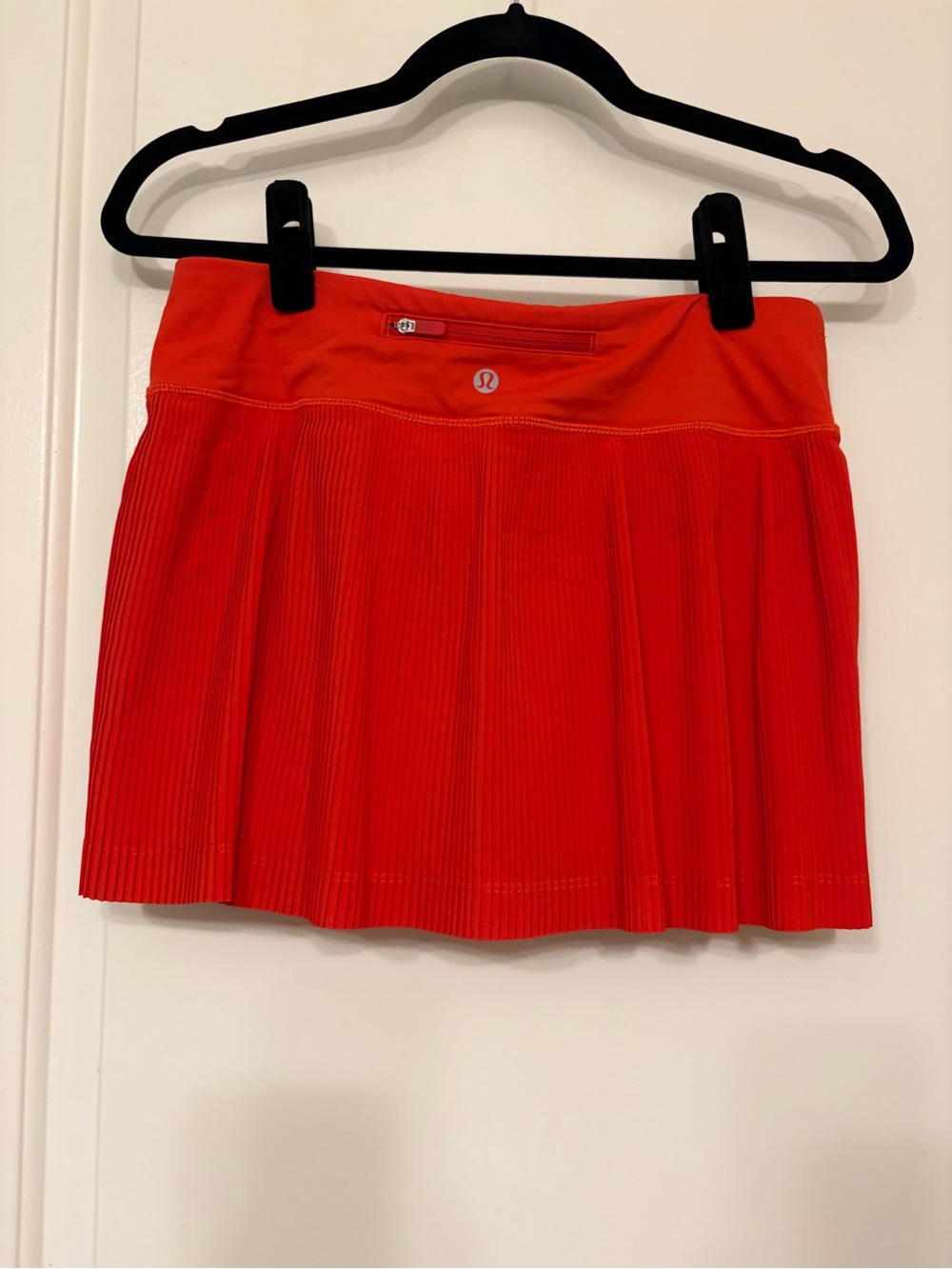 Like new: $88 LULULEMON RePleat High-Rise Tennis Skirt, Size 6, Hot Heat (Red)